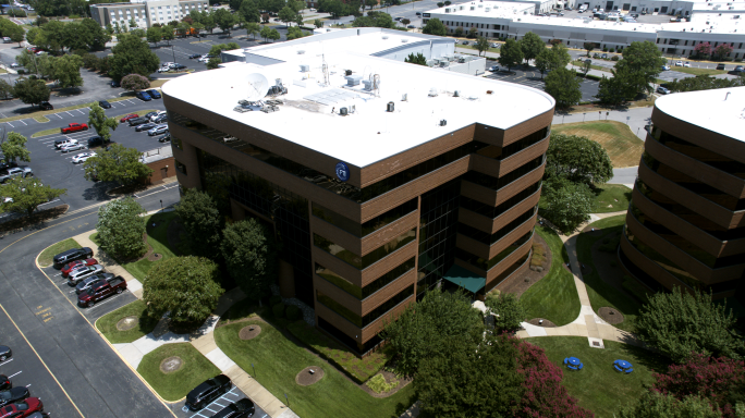 An aerial drone photograph of an office building in Hampton Roads, Virginia