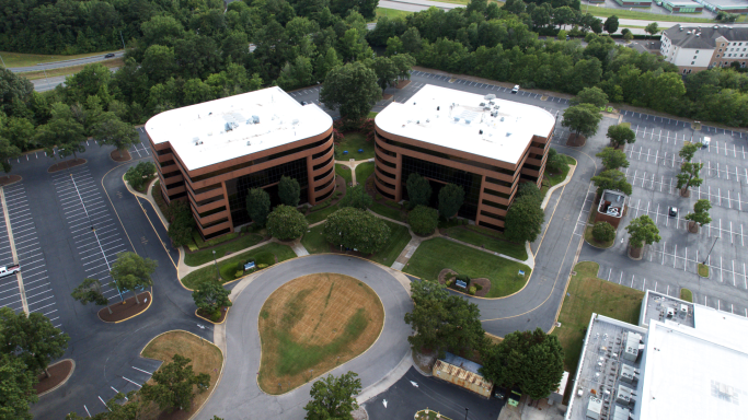 An aerial drone photograph of an office building in Hampton Roads, Virginia