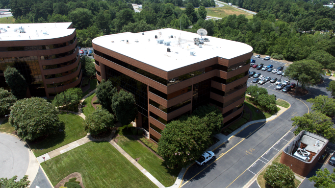 An aerial drone photograph of an office building in Hampton Roads, Virginia